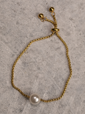Pulsera ajustable dorada con perla