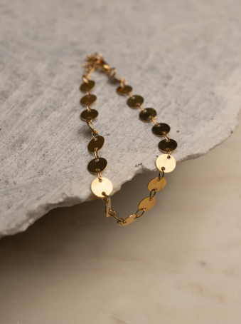 Pulsera de discos dorados en acero inoxidable